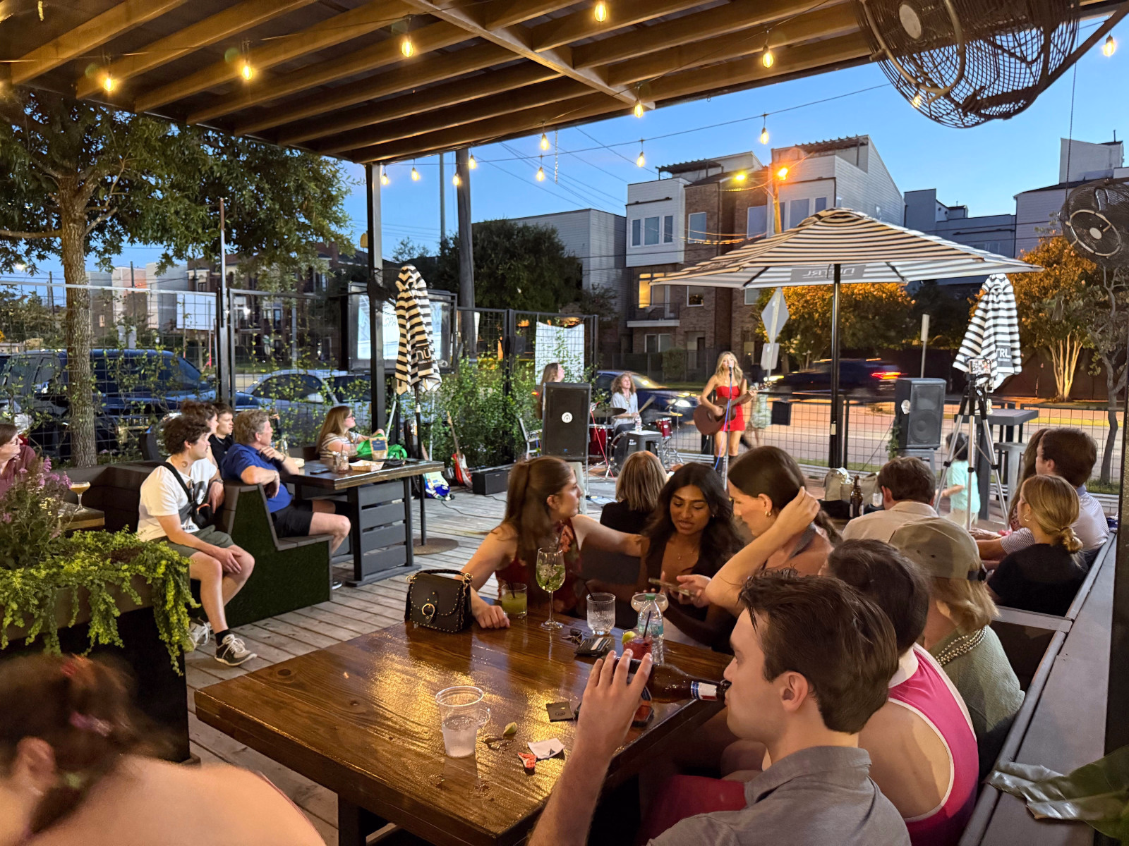 Live Music at Botanic Beer Garden Live music performance on the patio at Botanic Beer Garden in The Heights Houston at night