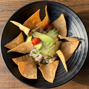 Ceviche Verde with tilapia, avocado, vegetables, and tortilla chips at Botanic Beer Garden in Houston